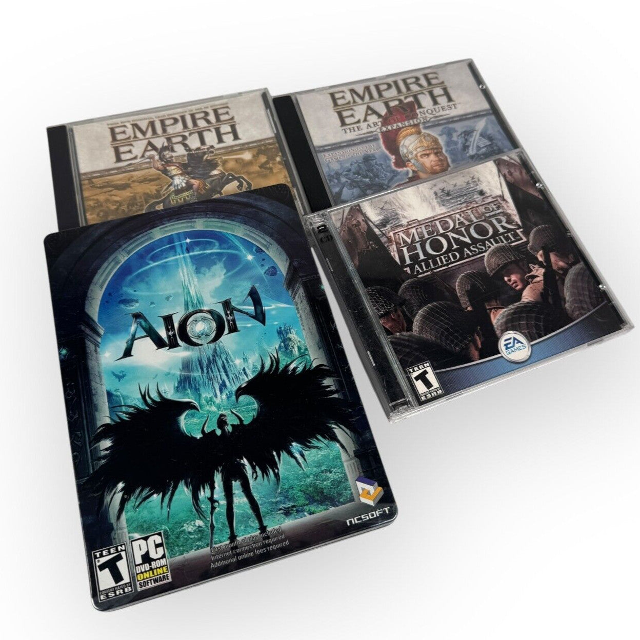 4 PC Games Lot Empire Earth w/ Expansion, AION & Medal of Honor Allied Assault