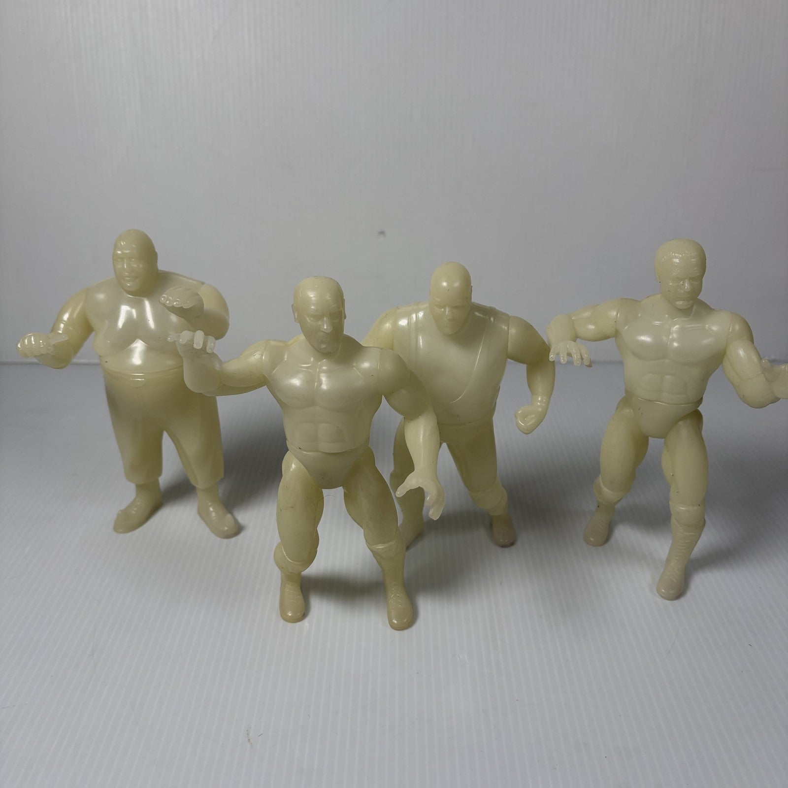 Legends of Pro Wrestling Glow in the Dark Figures Set of 4 WWF Bundy, Butcher