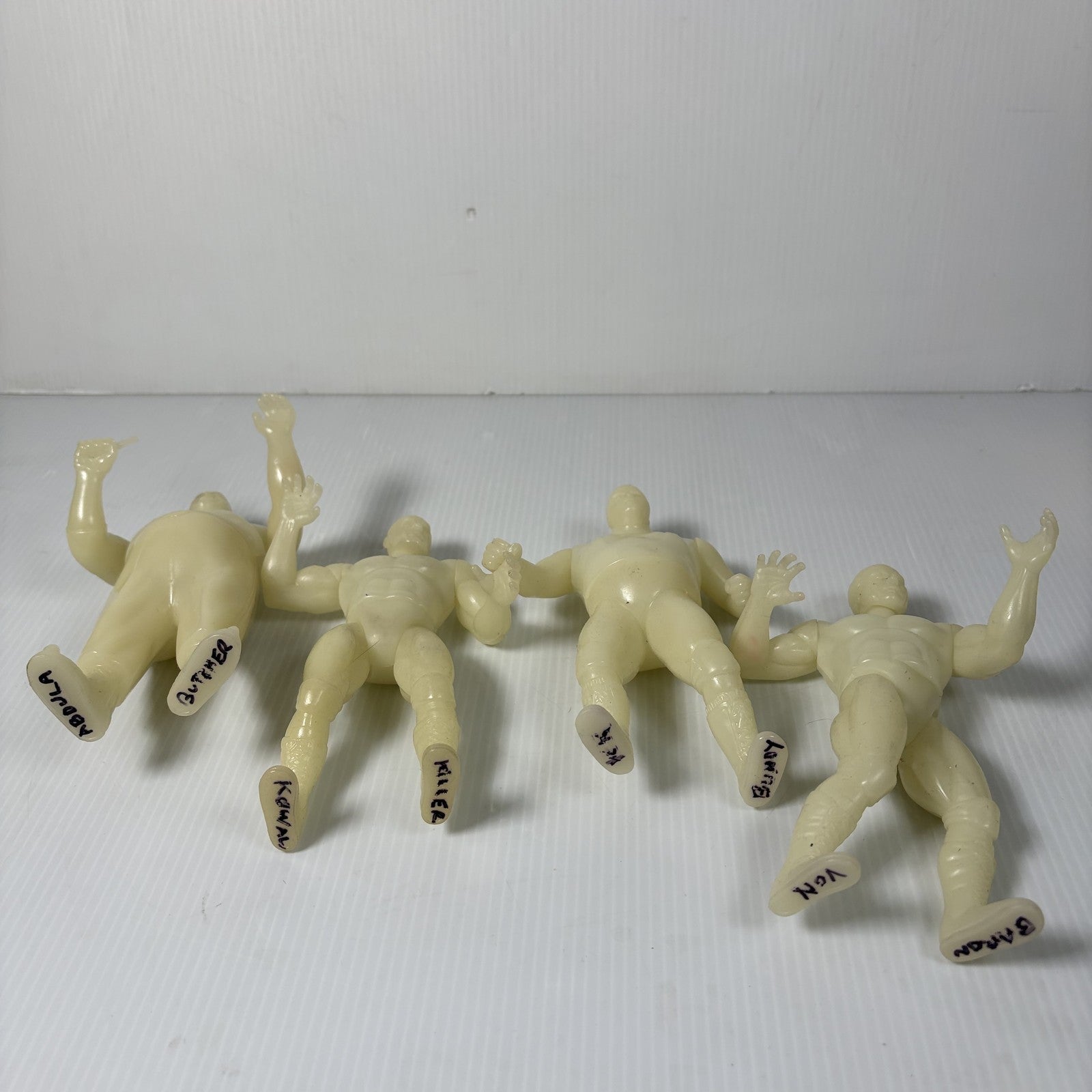 Legends of Pro Wrestling Glow in the Dark Figures Set of 4 WWF Bundy, Butcher