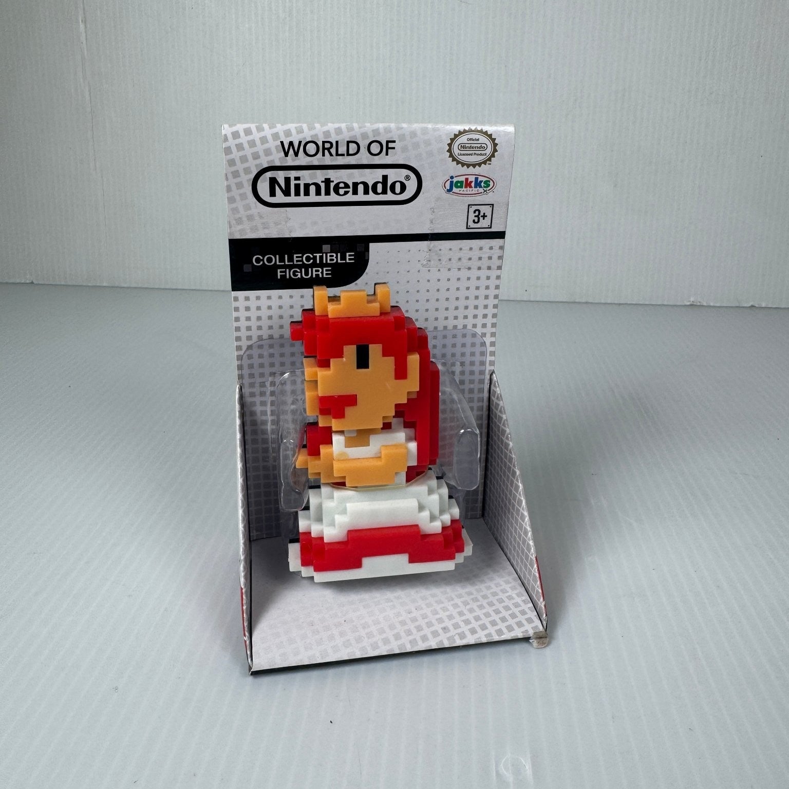 World of Nintendo 8-Bit Princess Peach Figure Super Mario 2.5" Retro