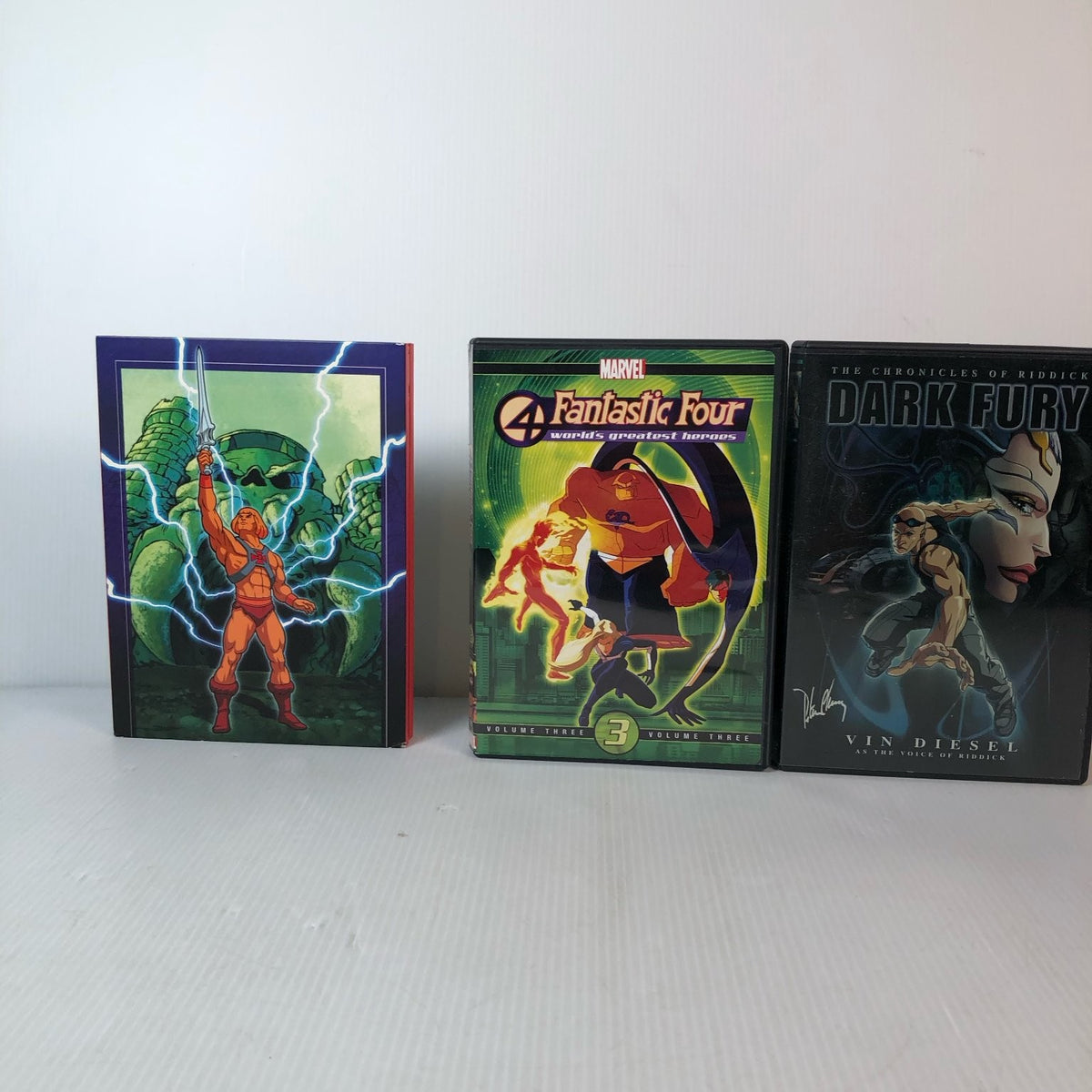 Lot of 9 Superhero & Comic Book Animated DVDs X-Men, He-Man, Hellboy & More