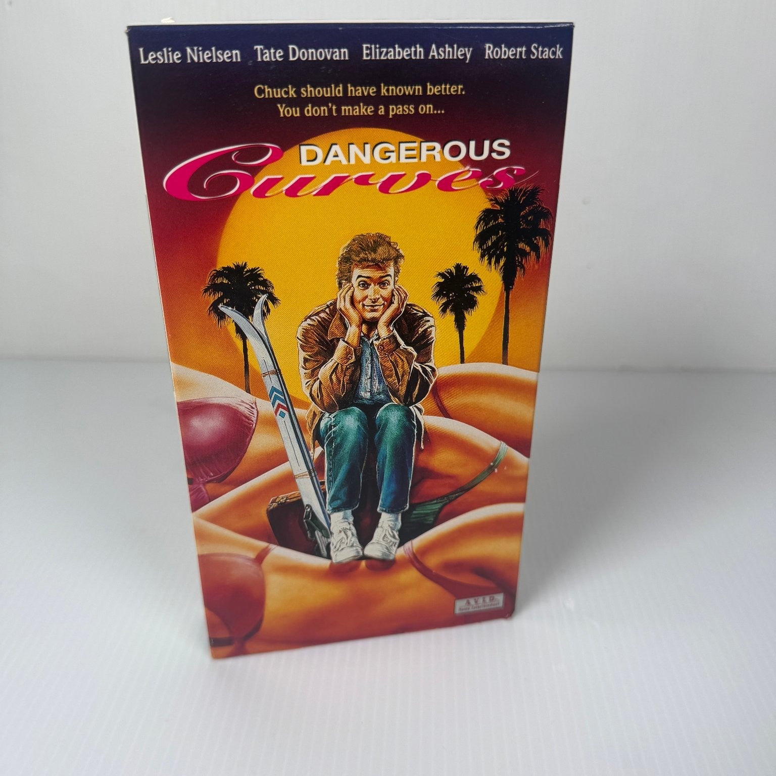 Dangerous Curves VHS 1988 Comedy Original Release Tate Donovan Leslie Nielsen