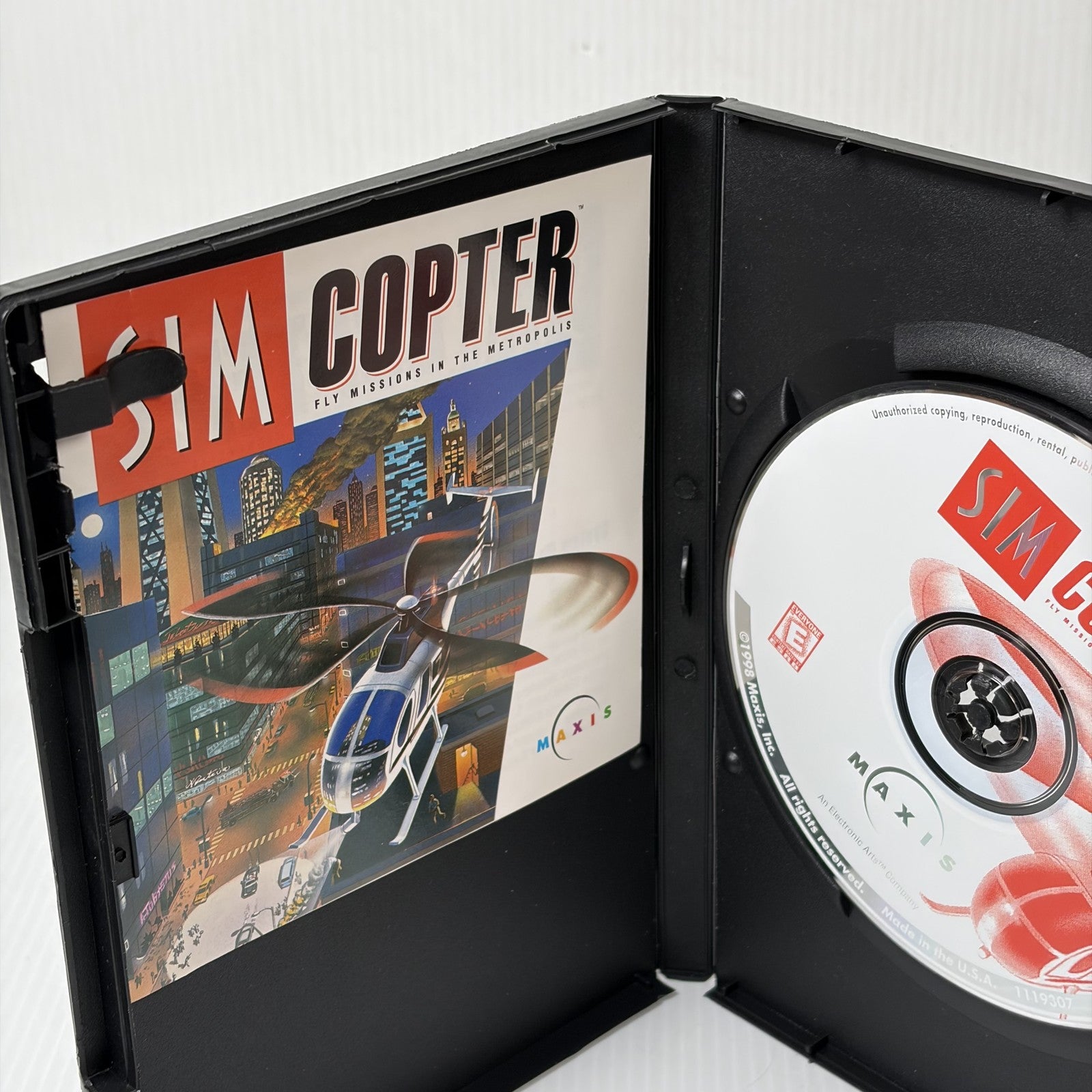 Sim Copter PC CD-ROM Game Disc and Manual Maxis Fly Missions in the Metropolis