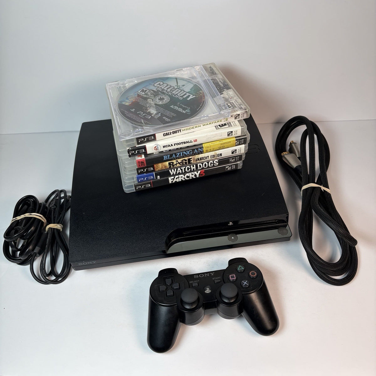 Sony PlayStation 3 Slim PS3 160GB Console w/ 7 Games & OEM Controller Black Ops