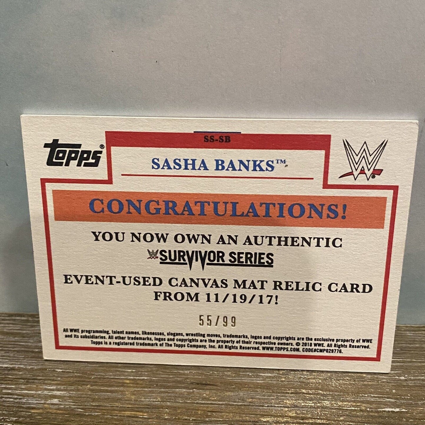 2018 Topps Heritage WWE Survivor Series Mat Relic Brown 55/99 Sasha Banks #SS-SB