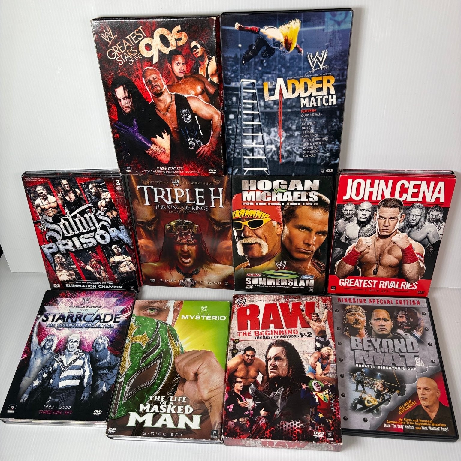 Lot of 10 WWE Anthologies and Pay-Per-View DVD Sets Starrcade, Summerslam & More
