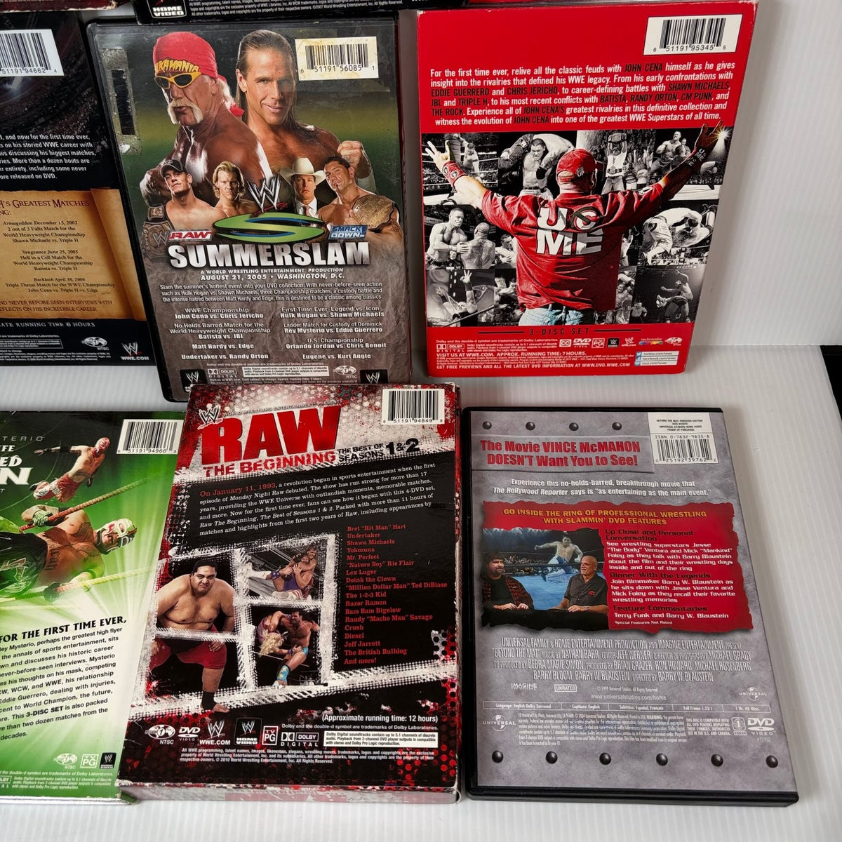 Lot of 10 WWE Anthologies and Pay-Per-View DVD Sets Starrcade, Summerslam & More