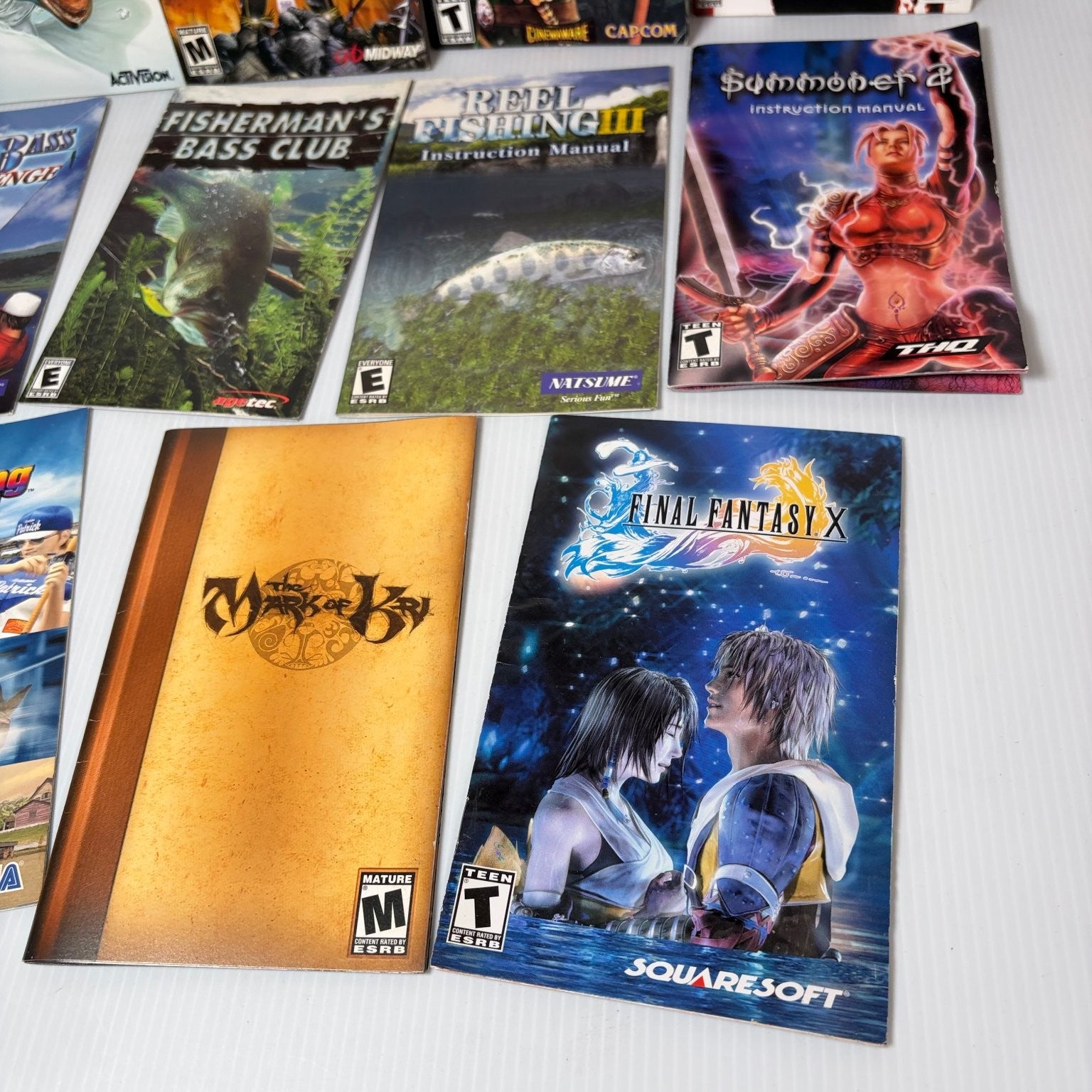 Lot of 11 Playstation 2 Manuals Rune, Excalibur, Mark of Kri, Summoner 2 & More