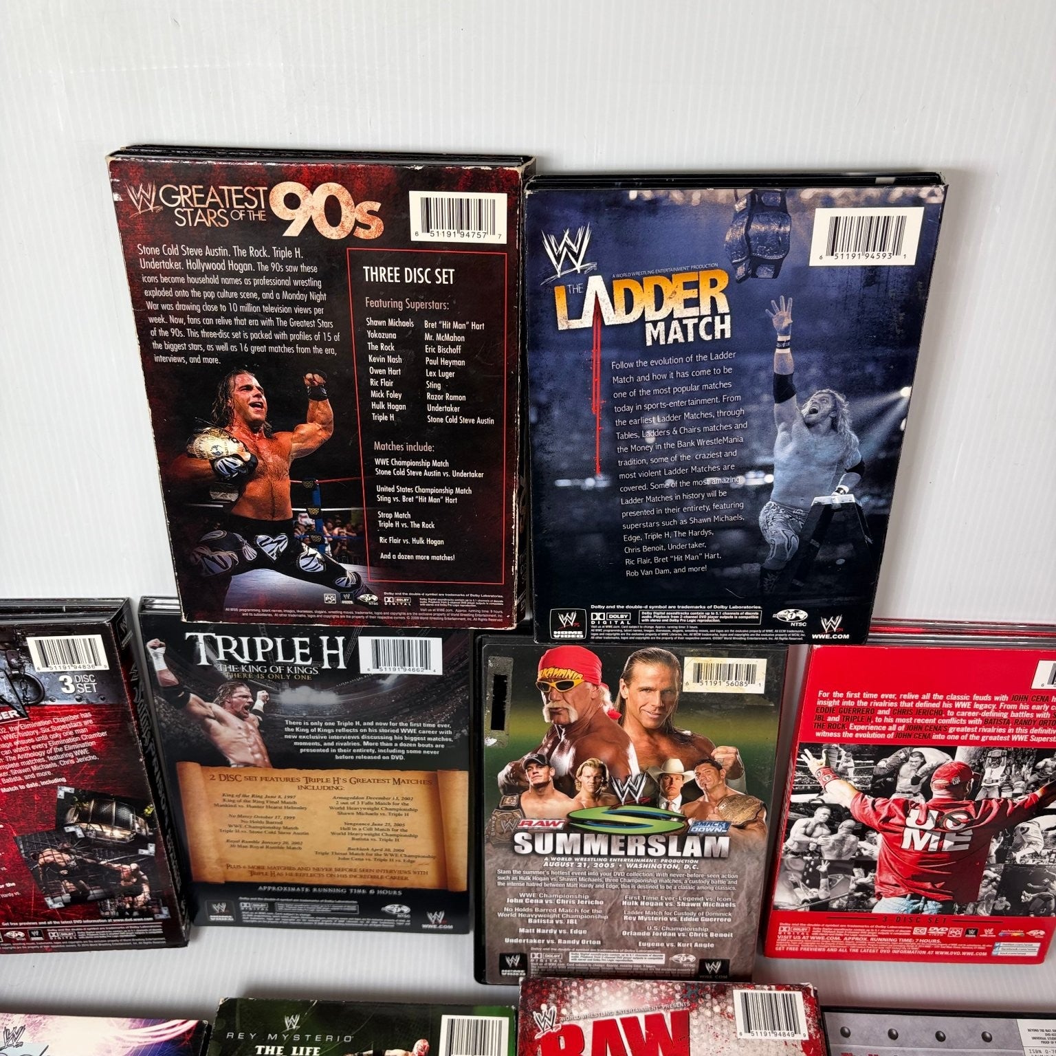 Lot of 10 WWE Anthologies and Pay-Per-View DVD Sets Starrcade, Summerslam & More