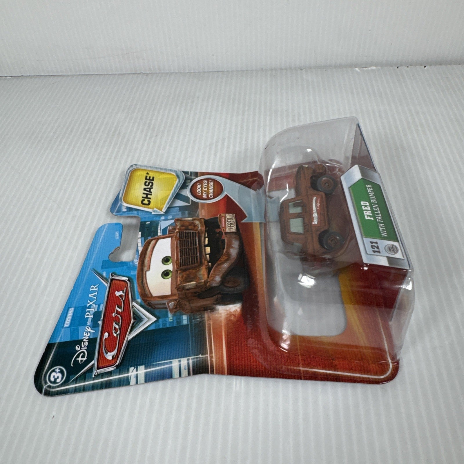 Mattel Disney Pixar Cars Lenticular Eyes Fred with Fallen Bumper No. 121 Chase
