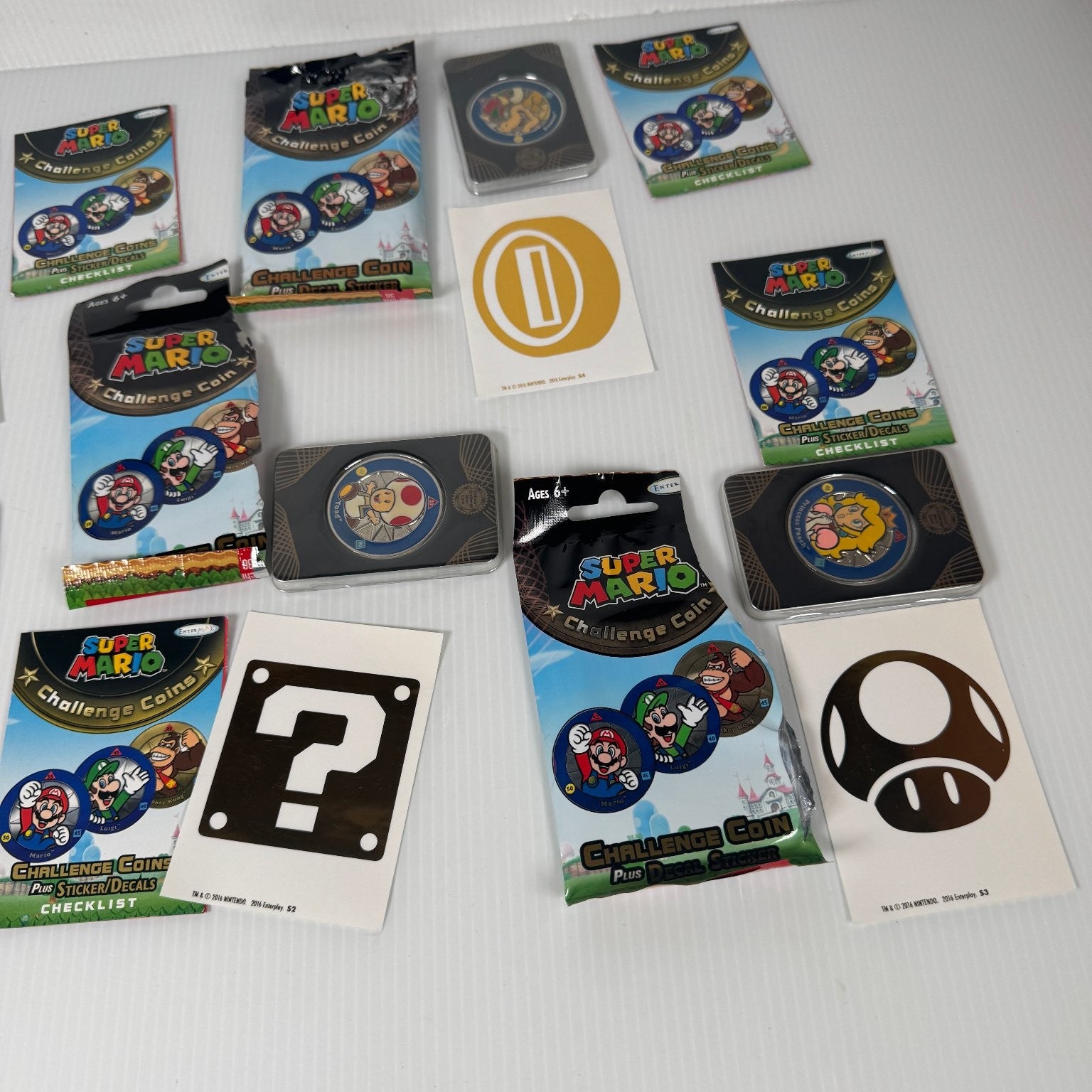 Enterplay Super Mario Challenge Coin Lot of 5 Opened with Stickers 2016