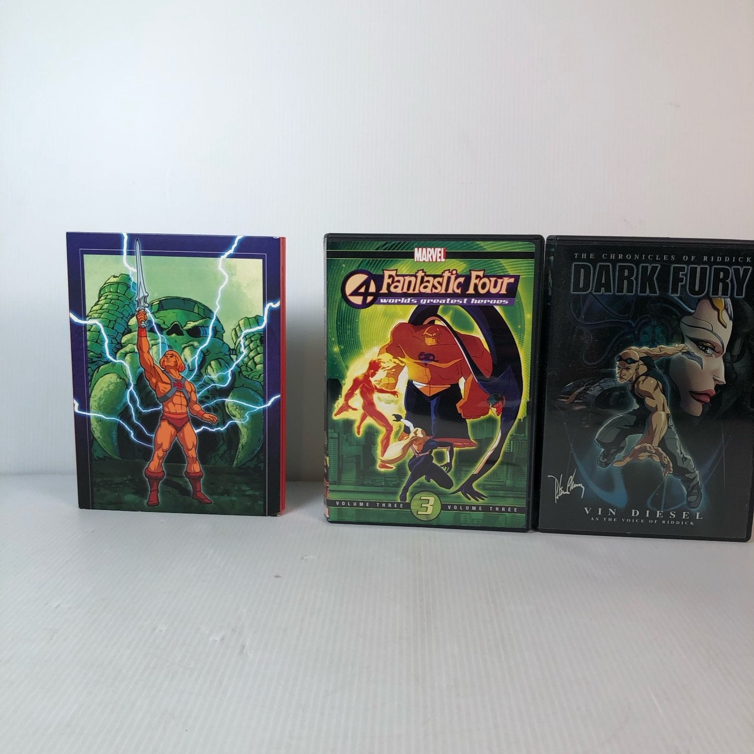 Lot of 9 Superhero & Comic Book Animated DVDs X-Men, He-Man, Hellboy & More