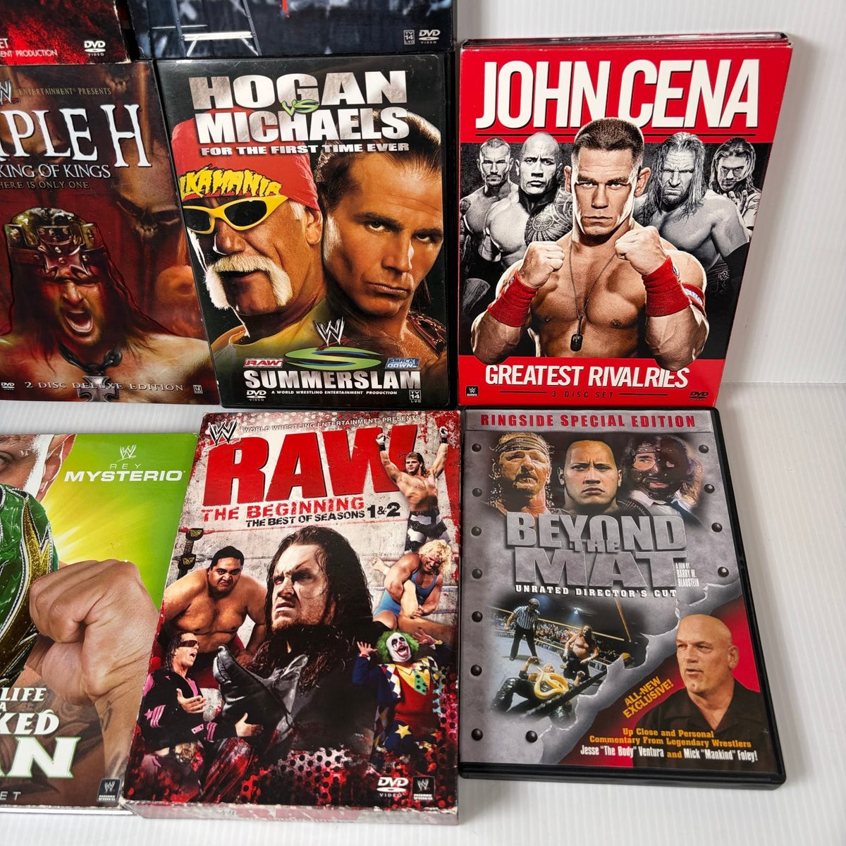 Lot of 10 WWE Anthologies and Pay-Per-View DVD Sets Starrcade, Summerslam & More