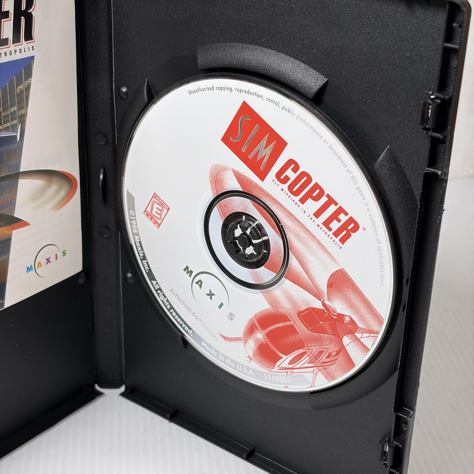 Sim Copter PC CD-ROM Game Disc and Manual Maxis Fly Missions in the Metropolis