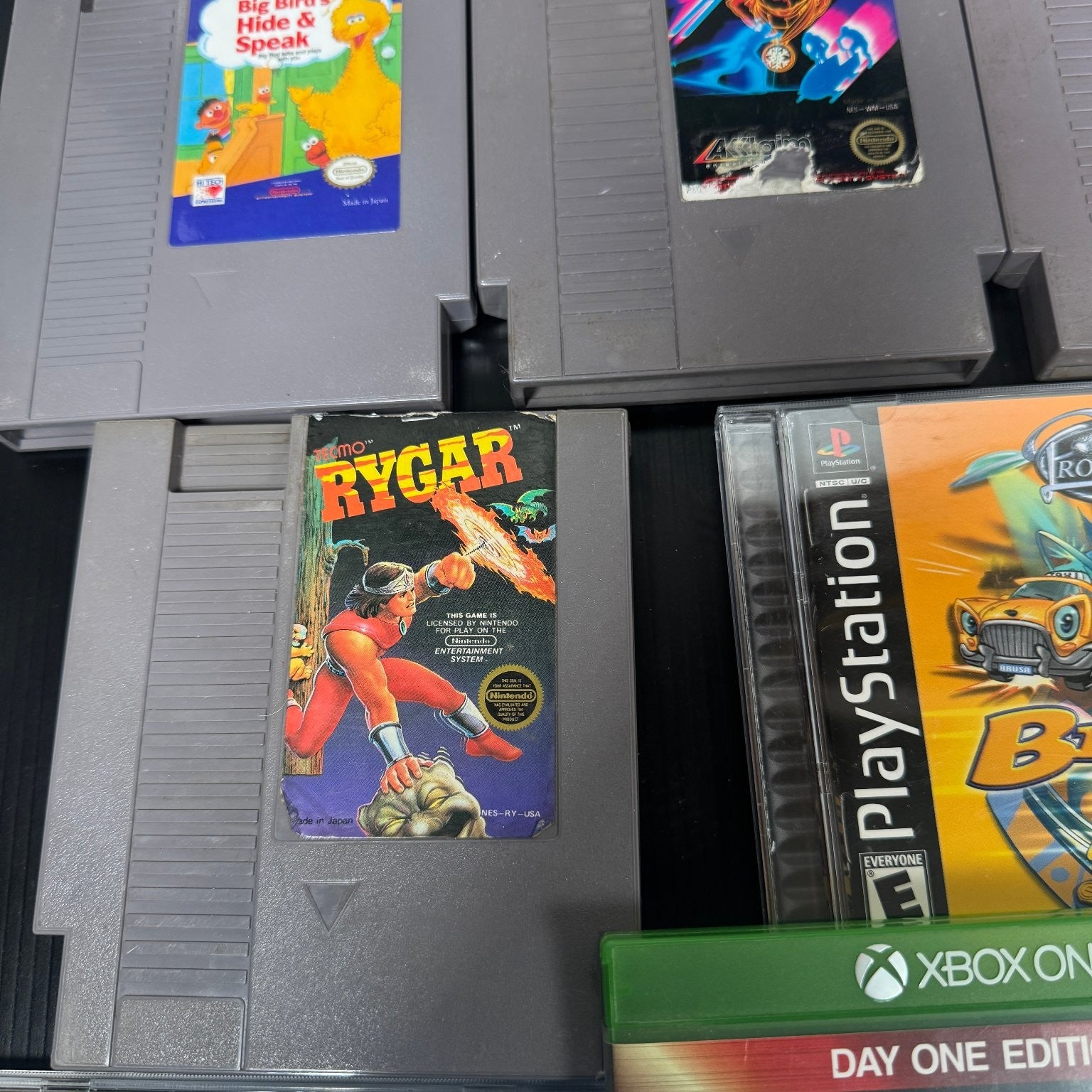 Mixed Lot of 20 NES, PS1 & Xbox One Games Rygar, Rare Replay, Witcher III & More