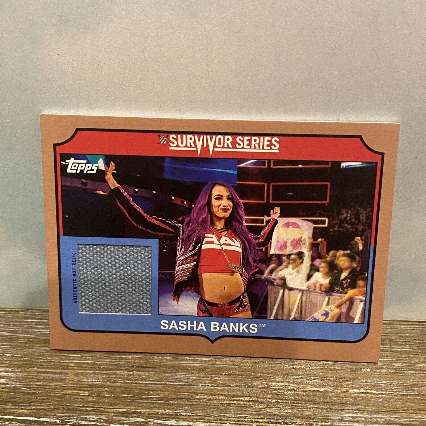 2018 Topps Heritage WWE Survivor Series Mat Relic Brown 55/99 Sasha Banks #SS-SB