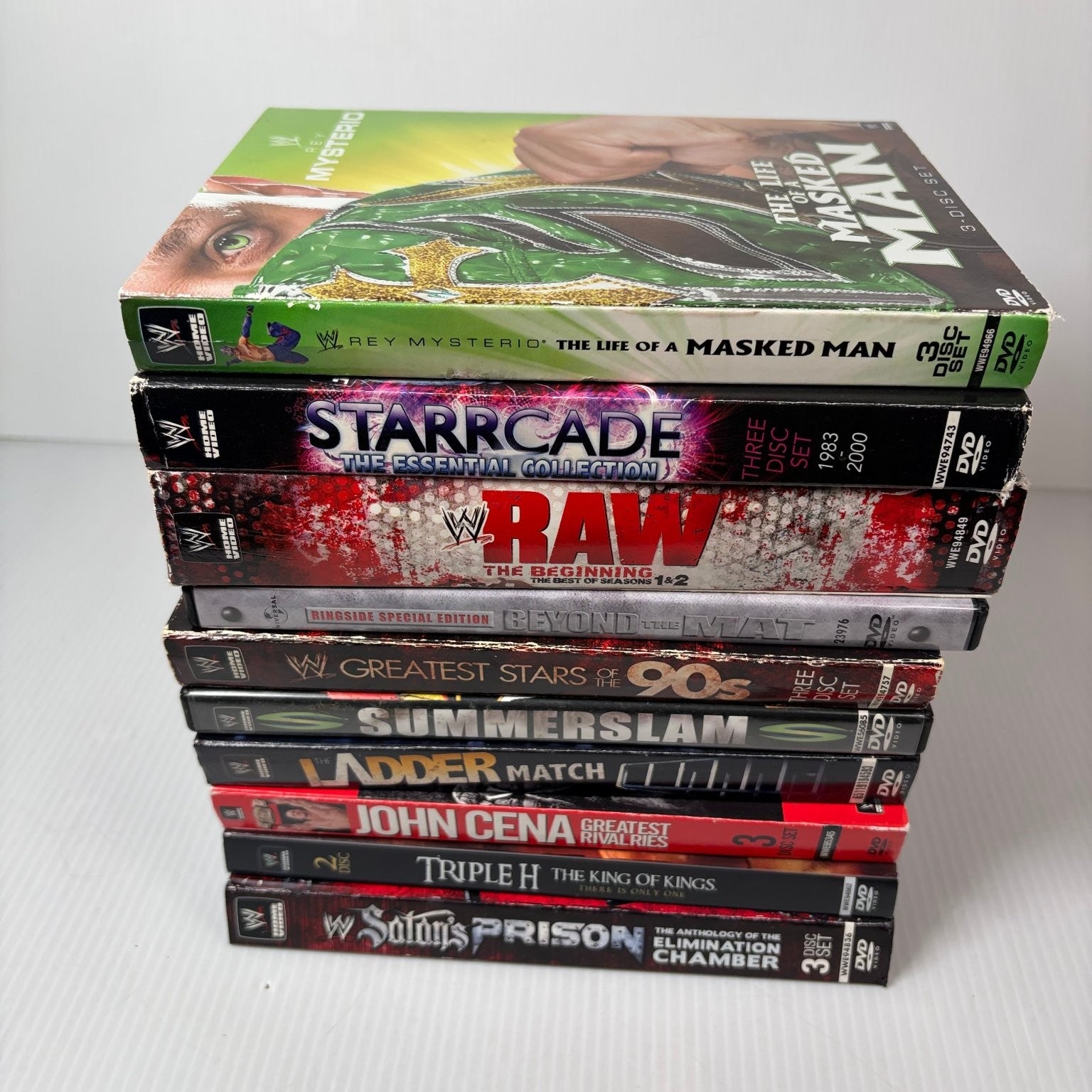 Lot of 10 WWE Anthologies and Pay-Per-View DVD Sets Starrcade, Summerslam & More