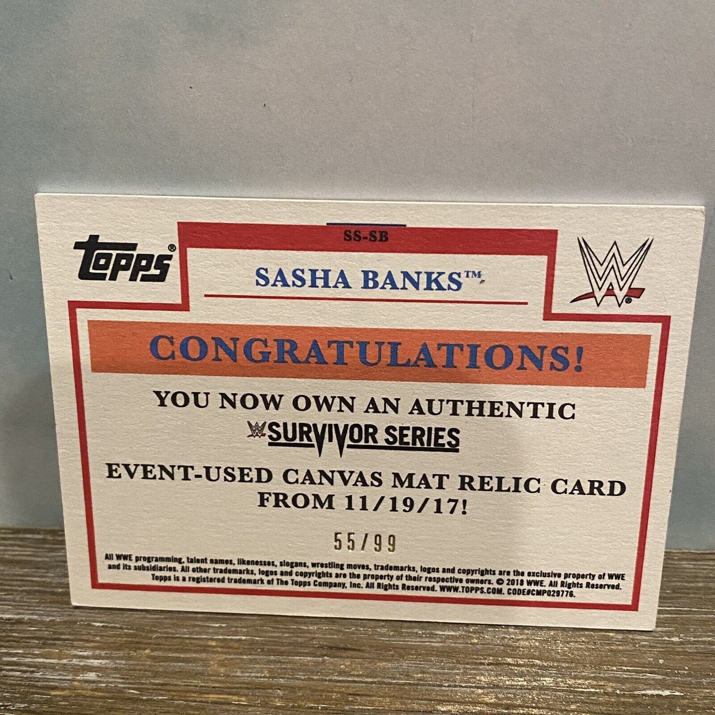 2018 Topps Heritage WWE Survivor Series Mat Relic Brown 55/99 Sasha Banks #SS-SB
